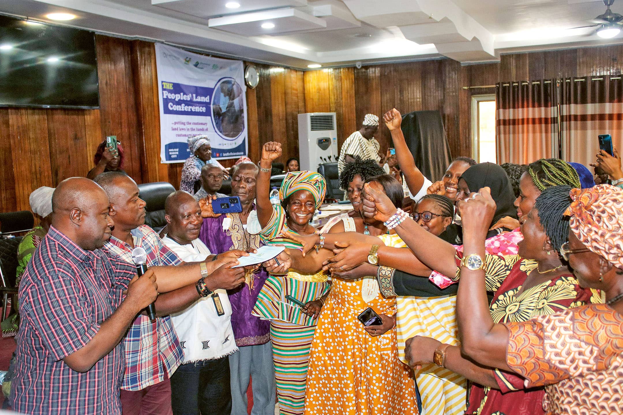 Symbolic handover of the Customary Land Rights Act to the customary people during the Peoples Land Conference in Makeni, Sierra Leone, May 2023.