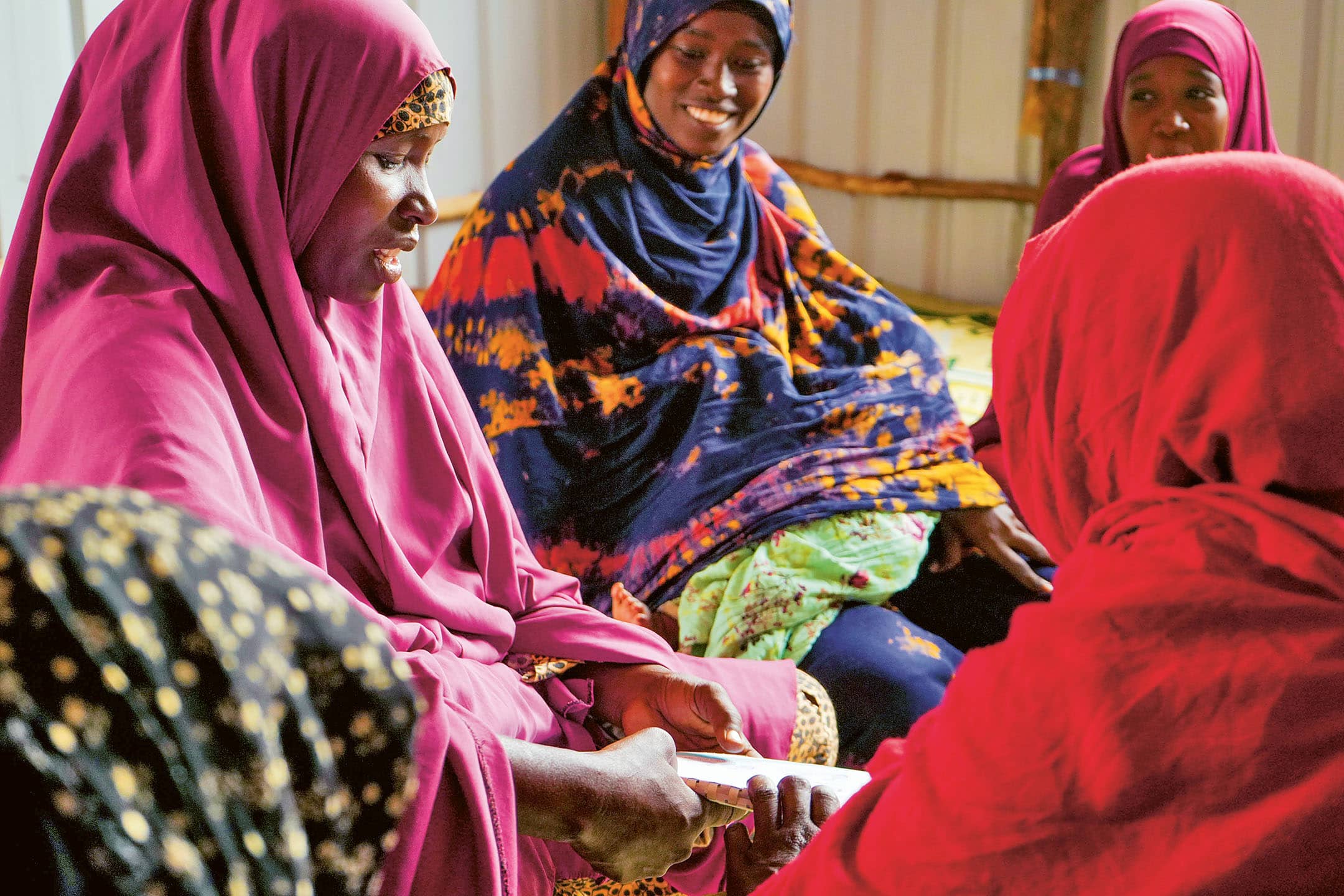 Shinda attends a mother-to-mother group that includes cooking
demonstrations and information on nutrition and healthy eating.